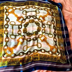 Mint condition Giannni Versace 1990’s scarf. Navy and animal print.